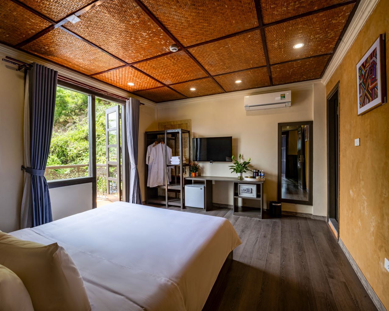 Bright room opening to the forested hillside